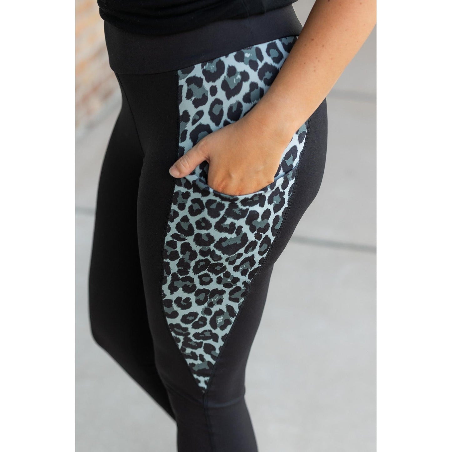 Snow leopard panel detail on Buttery soft leopard panel leggings for women by Julia Rose
